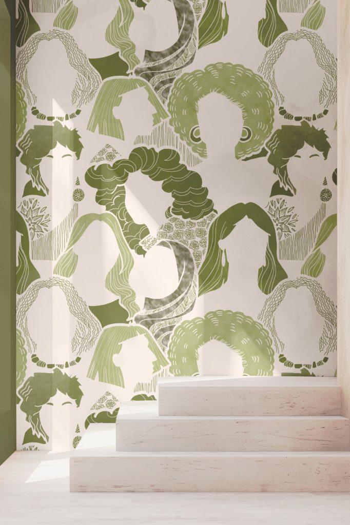 Un muro decorato con una carta da parati con volti di donna, pattern nella sua variante verde. ideale per spazi dedicati alla donna